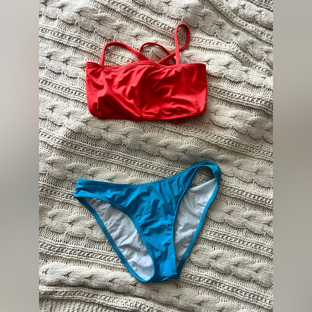 (4) bathing suit pieces - strapless top and three bottoms, size xs/s